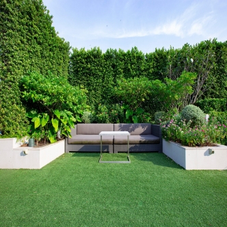 modern-sofa-and-furniture-on-rooftop-garden-M9KT5GW
