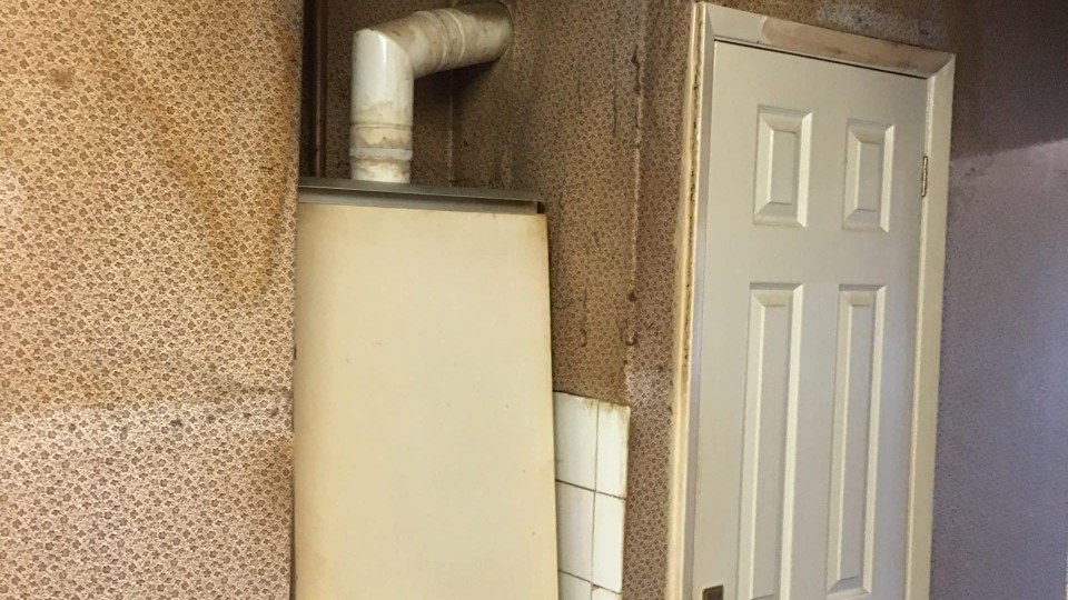 Old boiler & removal of wallpaper
