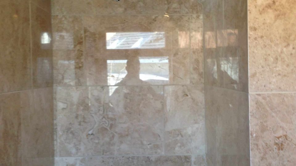 Shower area walls tiled, ceiling skimmed & painted