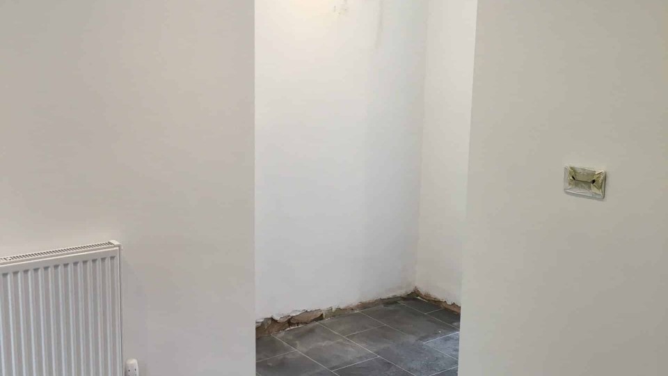 Kitchen walls after being skimmed & painted