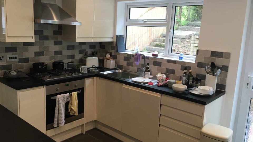 New kitchen with tiling and appliances fitted