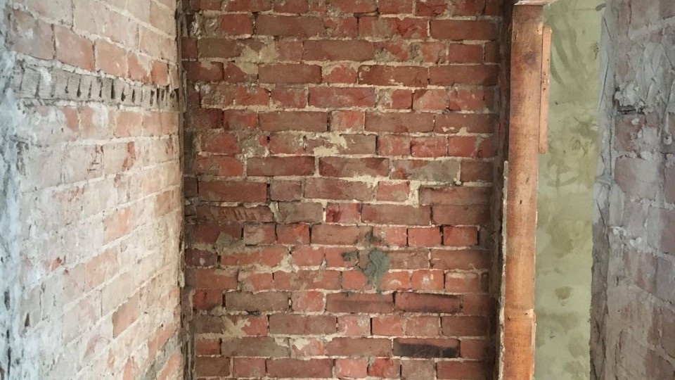 Walls striped back to original brickwork