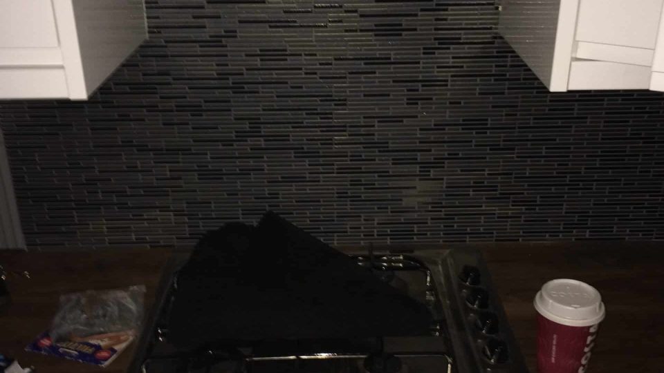 Kitchen walls tiled, worktops installed