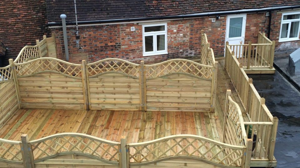 Finished decking area with fencing installed