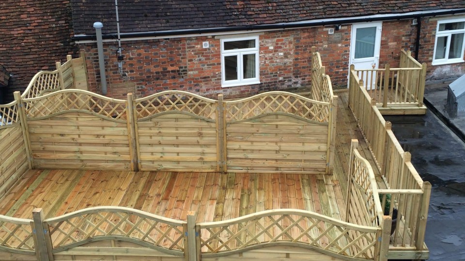 Finished decking area with fencing installed
