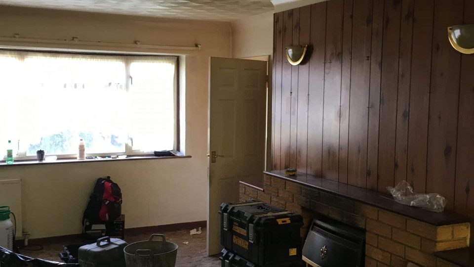 Living room wallpaper & carpet removed