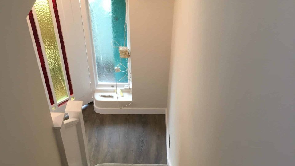 New staircase walls skimmed & painted with new carpet.