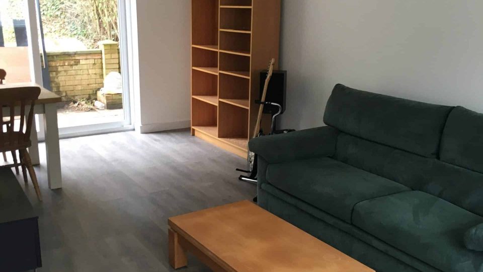 New living room with walls & ceiling & walls skimmed, with new flooring & skirting boards