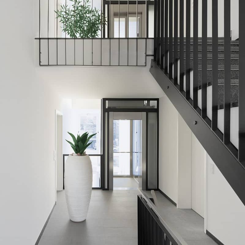 staircase-and-hallway-in-modern-house-VTJL8S2.jpg